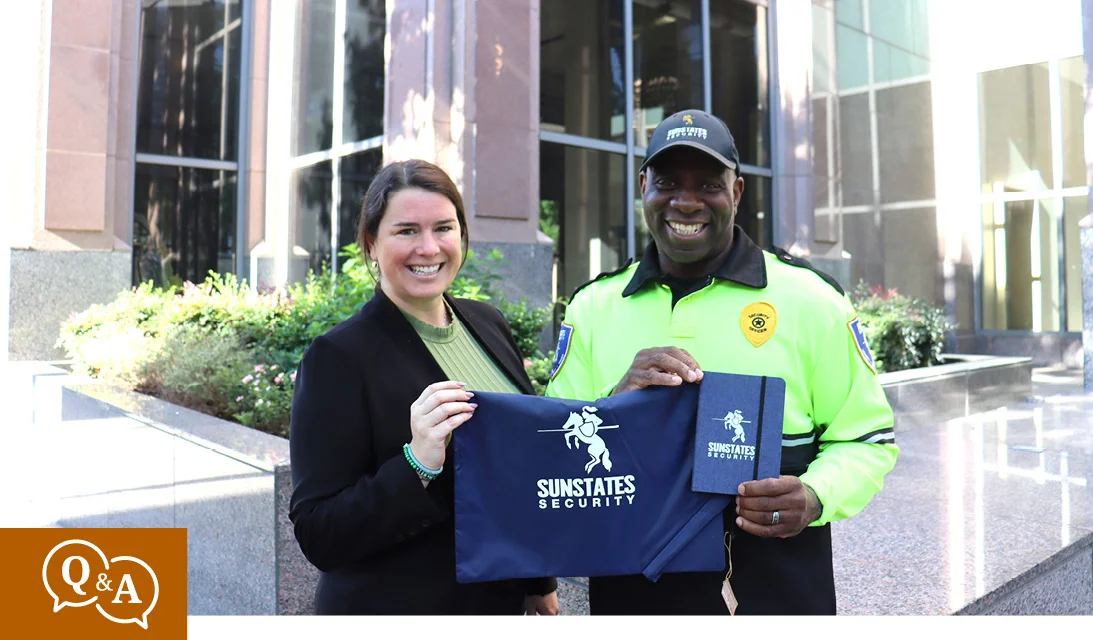 employees showing off logoed giveaways