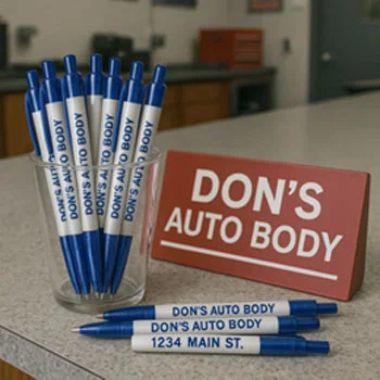 custom logoed pens in a mug