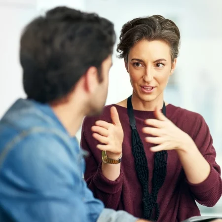 Manager giving feedback to an employee.