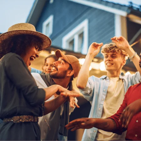 group of people celebrating at a backyard bbq