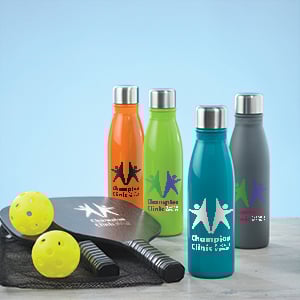 Business gifts that include a pickleball set and water bottles