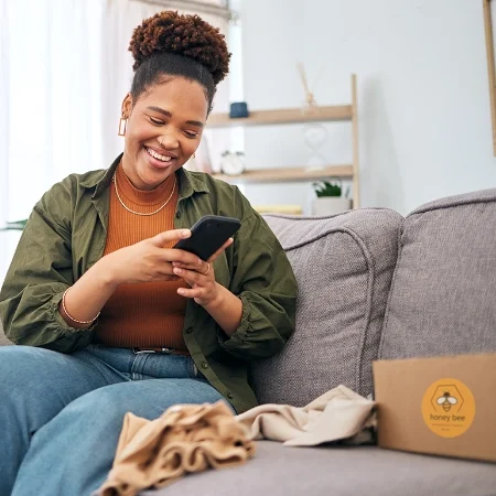 Influencer taking a picture of a product.