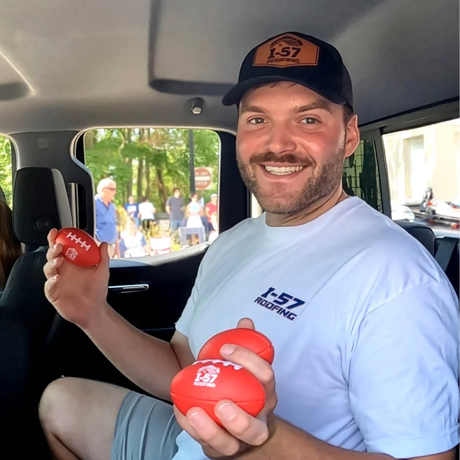 a person holding stress balls