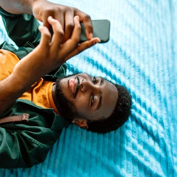 Man scrolling on phone
