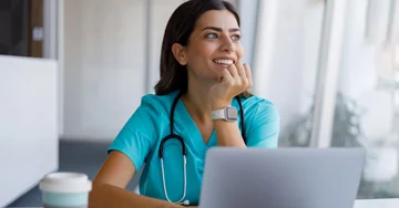 Nurse at computer typing