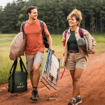 Two people hiking holding camping gear including a cooler.