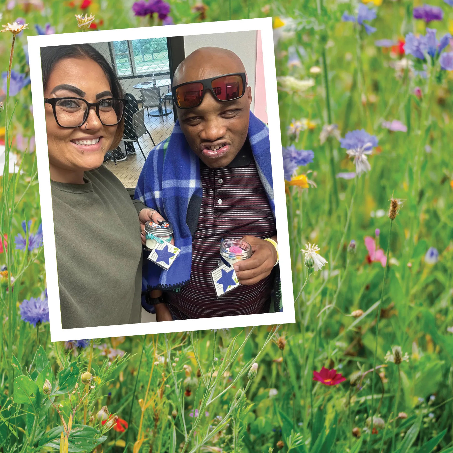 Two people holding seed packets