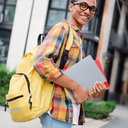 Person walking to class with backpack