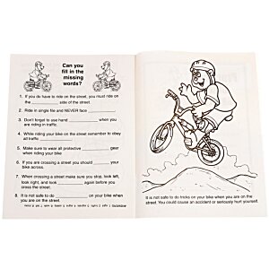 Additional Image 1 - a white paper with black text and a drawing of a man on a bike