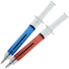 a close-up of two syringes