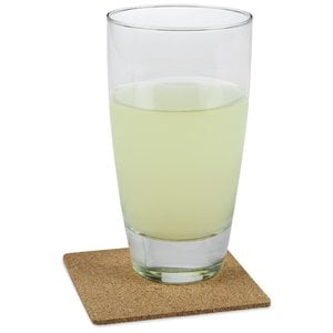 Additional Image 3 - a glass of yellow liquid on a coaster