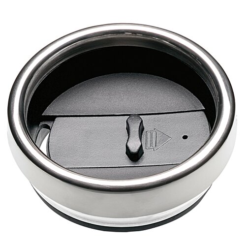 Additional Image 1 - a round metal object with a button