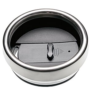 Additional Image 1 - a round metal object with a button