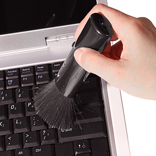 Additional Image 2 - a hand holding a brush over a keyboard