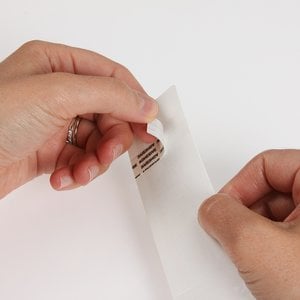 Additional Image 2 - a person's hands holding a piece of paper