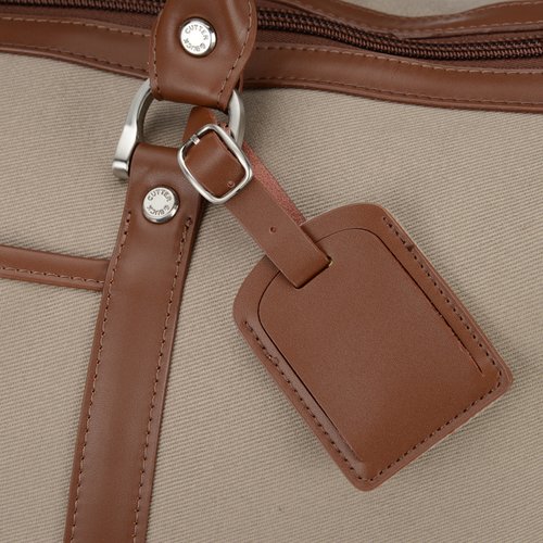 Additional Image 3 - a brown leather tag on a white bag