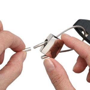 Additional Image 2 - a close-up of hands holding a lock