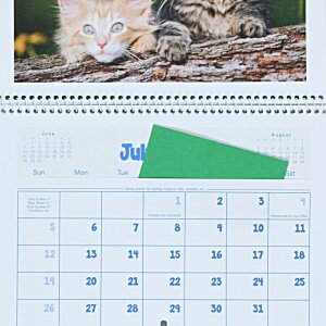 Additional Image 2 - a calendar with a yellow sticky note