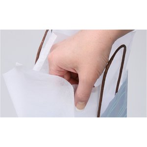 Additional Image 1 - a hand holding a white object