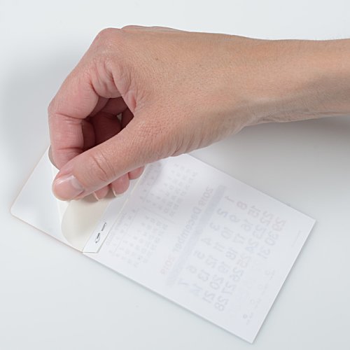 Additional Image 2 - a hand holding a white piece of paper