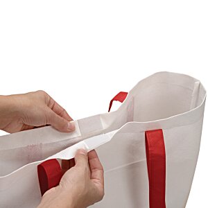 Additional Image 1 - a person holding a white bag