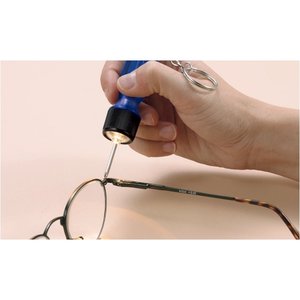 Additional Image 2 - a hand holding a blue bottle