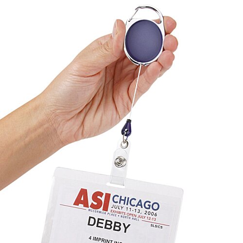 Additional Image 2 - a hand holding a badge