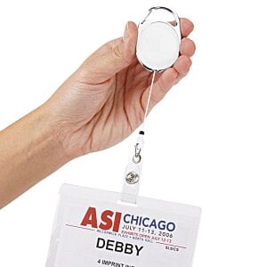 Additional Image 2 - a hand holding a badge