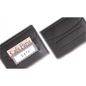 Additional Image 1 - a black rectangular object with a white label