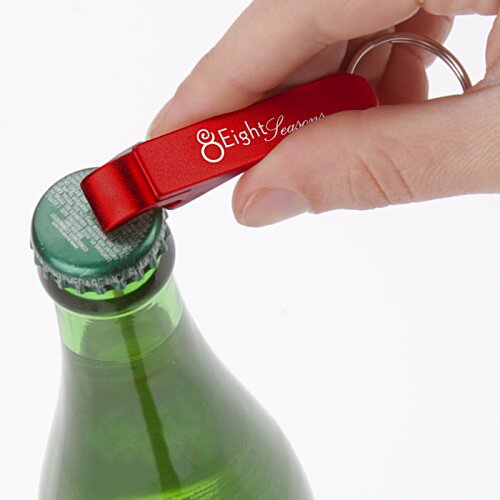 Additional Image 4 - a hand opening a bottle of soda