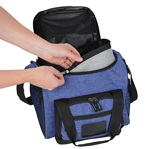 Additional Image 3 - a person opening a blue and black bag
