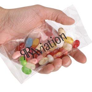 Additional Image 1 - a hand holding a bag of candy