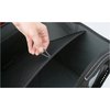 a hand reaching out to the side of a suitcase