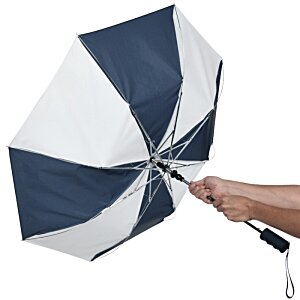 Additional Image 4 - a person holding an umbrella