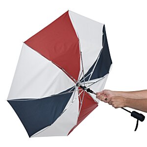 Additional Image 4 - a hand holding a red white and blue umbrella