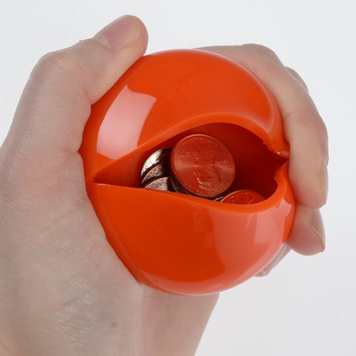 Additional Image 1 - a hand holding an orange ball