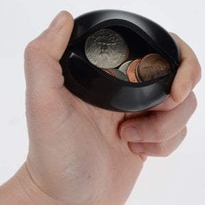 Additional Image 1 - a hand holding a black circular object