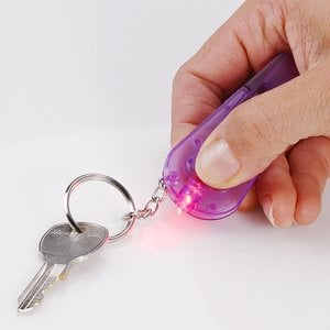 Additional Image 1 - a hand holding a pink key chain