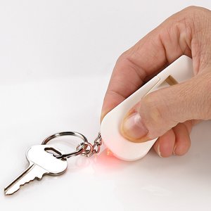 Additional Image 1 - a hand holding a key