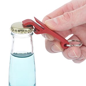 Additional Image 2 - a hand holding a bottle with a red pliers