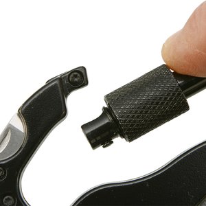 Additional Image 1 - a close up of a hand holding a black and silver device