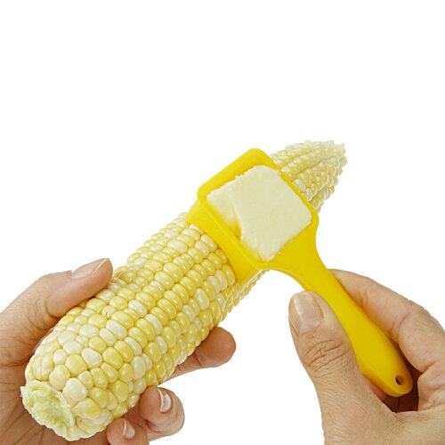 Additional Image 2 - a person peeling a corn