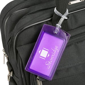 Additional Image 2 - a purple luggage tag on a black bag