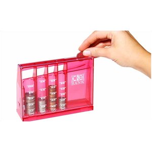 Additional Image 1 - a hand holding a small red container