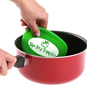 Additional Image 1 - a person holding a green lid in a red pot