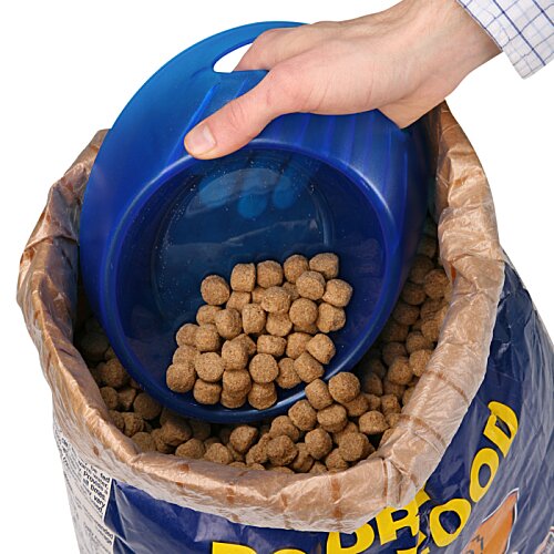 Additional Image 3 - a hand holding a blue bowl with brown balls in a bag