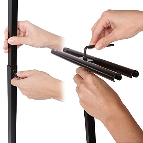 Additional Image 1 - a close-up of hands holding a black pole