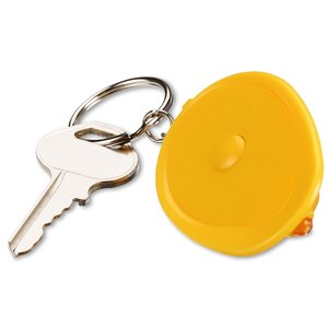 Additional Image 3 - a key chain and a tape measure