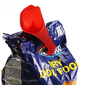 Additional Image 1 - a red scoop sticking out of a blue bag