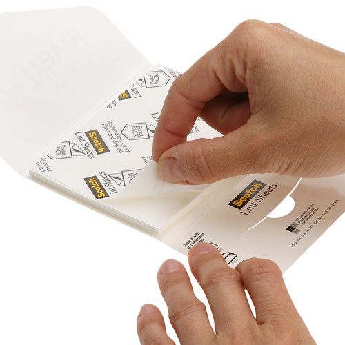 Additional Image 1 - a person holding a piece of paper